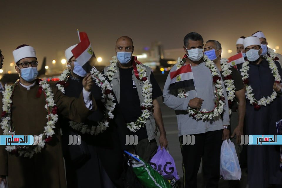 استقبال المصريين العائدين من أفغانستان